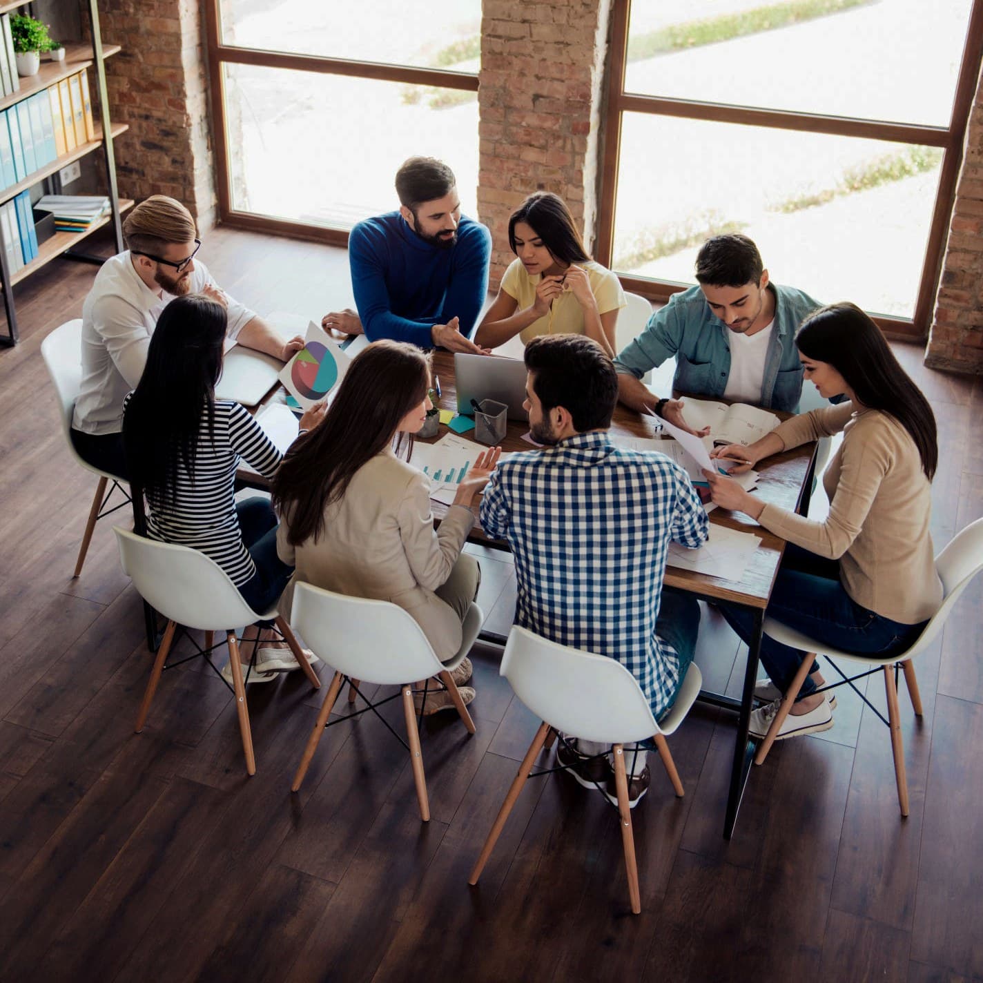 A Humareso team working through a problem together
